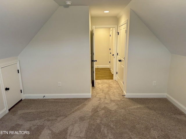 2107 Lantern Park Ln, Knoxville, TN 37932 - additional living space with vaulted ceiling and carpet flooring