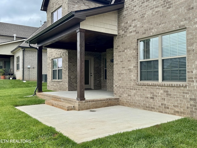 2107 Lantern Park Ln, Knoxville, TN 37932 - doorway to property with a lawn and brick siding