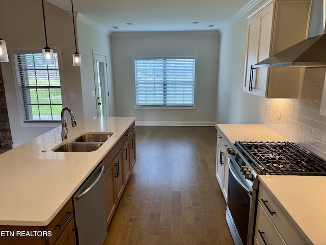 2107 Lantern Park Ln, Knoxville, TN 37932 - kitchen featuring wall chimney range hood, appliances with stainless steel finishes, dark wood-style floors, decorative backsplash, and a center island with sink