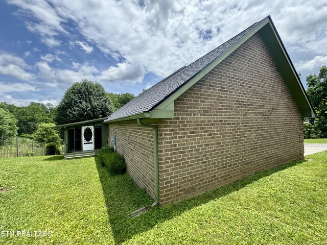 135 Whisper Creek Rd, Lafollette, TN 37766 - view of side of property with brick siding