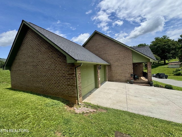 135 Whisper Creek Rd, Lafollette, TN 37766 - view of side of property with brick siding, a lawn, and roof with shingles