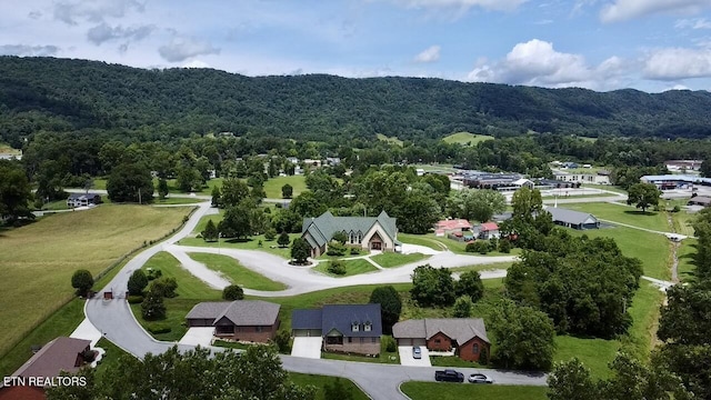 135 Whisper Creek Rd, Lafollette, TN 37766 - drone / aerial view of a forest and a mountainous background