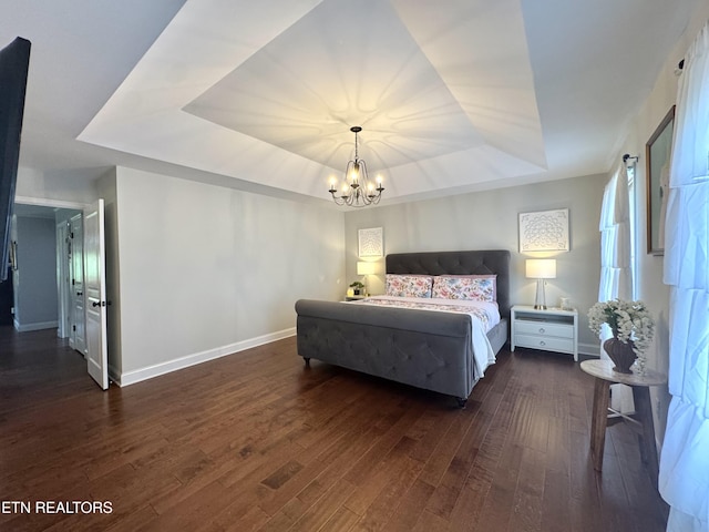 135 Whisper Creek Rd, Lafollette, TN 37766 - bedroom with a tray ceiling, a chandelier, and dark wood finished floors