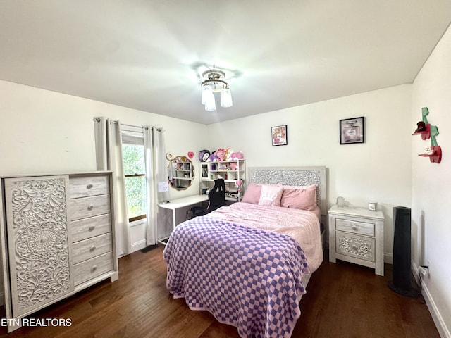 135 Whisper Creek Rd, Lafollette, TN 37766 - bedroom featuring dark wood-style floors and baseboards