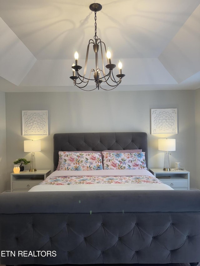 135 Whisper Creek Rd, Lafollette, TN 37766 - bedroom with a raised ceiling and a chandelier
