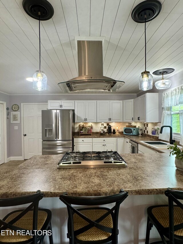 135 Whisper Creek Rd, Lafollette, TN 37766 - kitchen featuring stainless steel appliances, ventilation hood, a kitchen bar, white cabinetry, and wood ceiling