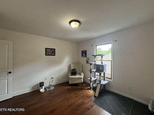 135 Whisper Creek Rd, Lafollette, TN 37766 - living area with dark wood-type flooring and baseboards