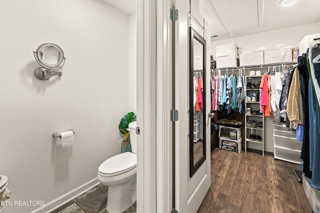 1426 Mesquite Dr, Sevierville, TN 37876 - bathroom featuring wood finished floors and a walk in closet