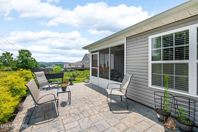 1426 Mesquite Dr, Sevierville, TN 37876 - view of patio featuring a sunroom
