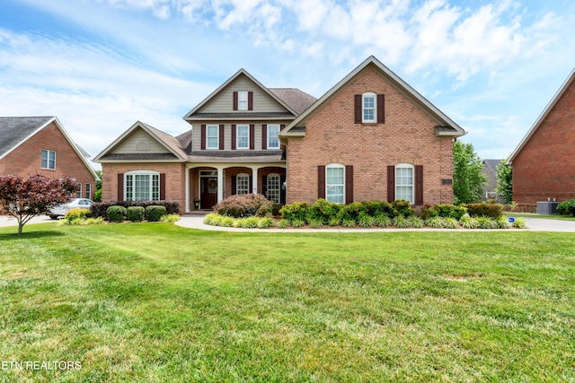 510 Argyle Way, Maryville, TN 37801 - view of front facade with brick siding, a front yard, and covered porch