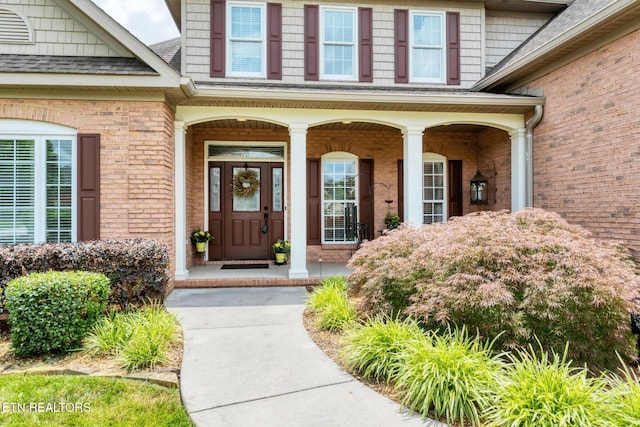 510 Argyle Way, Maryville, TN 37801 - property entrance featuring a porch, brick siding, and a shingled roof