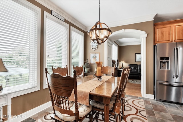 510 Argyle Way, Maryville, TN 37801 - dining room with arched walkways, ornamental molding, and a chandelier
