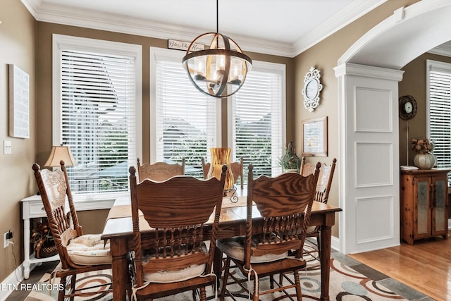510 Argyle Way, Maryville, TN 37801 - dining room featuring a chandelier, arched walkways, light wood-style flooring, and ornamental molding
