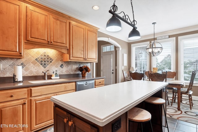 510 Argyle Way, Maryville, TN 37801 - kitchen with stainless steel dishwasher, arched walkways, a center island, tasteful backsplash, and a chandelier