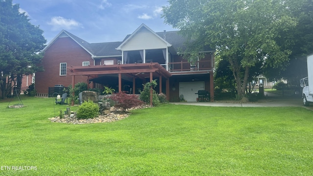 1843 River Vista Cir, Sevierville, TN 37876 - back of house featuring a yard, a garage, a deck, and concrete driveway