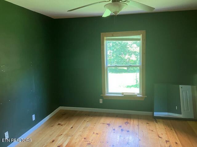 4016 Retro Hughes Rd, Graysville, TN 37338 - spare room featuring a ceiling fan and light wood finished floors