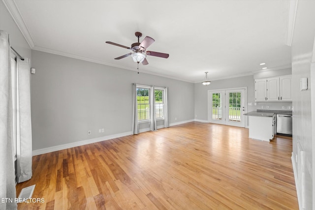 171 Wrenwood Way, Greenback, TN 37742 - unfurnished living room with plenty of natural light, ceiling fan, light wood finished floors, and ornamental molding