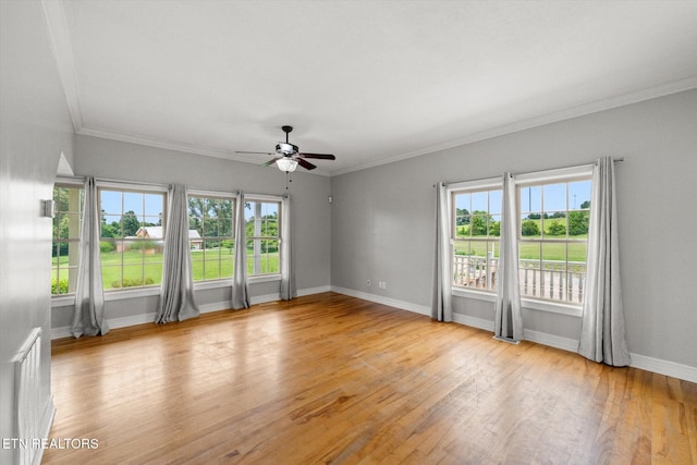 171 Wrenwood Way, Greenback, TN 37742 - spare room featuring ceiling fan, plenty of natural light, light wood-style floors, and crown molding