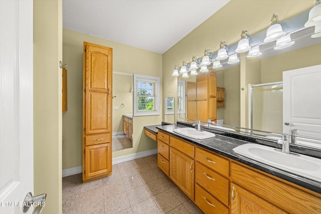 171 Wrenwood Way, Greenback, TN 37742 - bathroom with double vanity, a shower stall, and granite floors