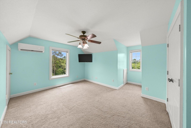 171 Wrenwood Way, Greenback, TN 37742 - spare room featuring a wall mounted air conditioner, lofted ceiling, a ceiling fan, and carpet