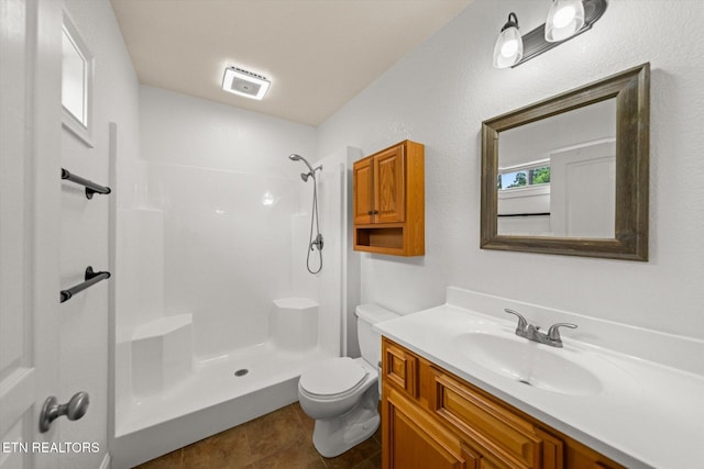 171 Wrenwood Way, Greenback, TN 37742 - bathroom featuring a shower, vanity, and tile patterned flooring