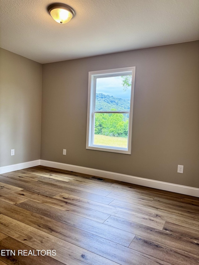 408 Luttrell Rd, Maynardville, TN 37807 - unfurnished room featuring wood finished floors and baseboards