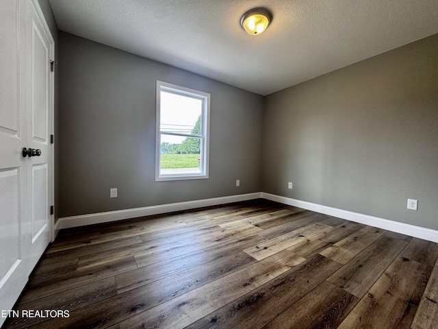 408 Luttrell Rd, Maynardville, TN 37807 - empty room featuring dark wood finished floors and baseboards
