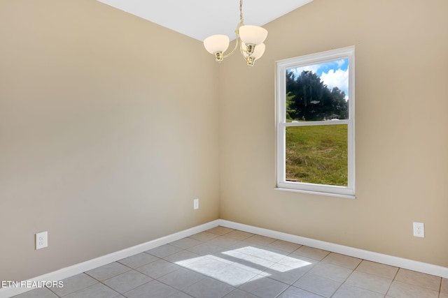 8040 Walt Way, Corryton, TN 37721 - unfurnished room featuring a chandelier, healthy amount of natural light, and light tile patterned flooring