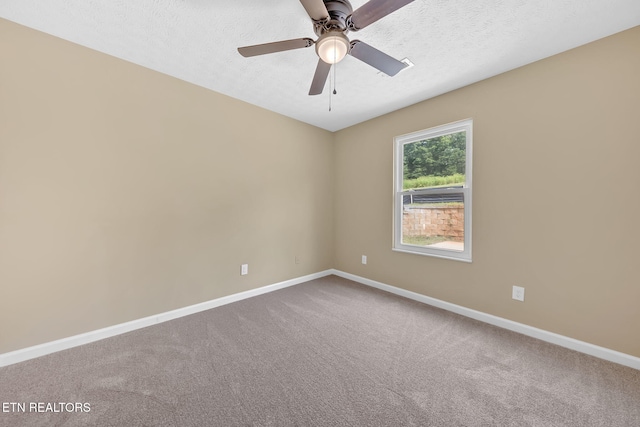 8040 Walt Way, Corryton, TN 37721 - empty room with carpet, ceiling fan, and a textured ceiling