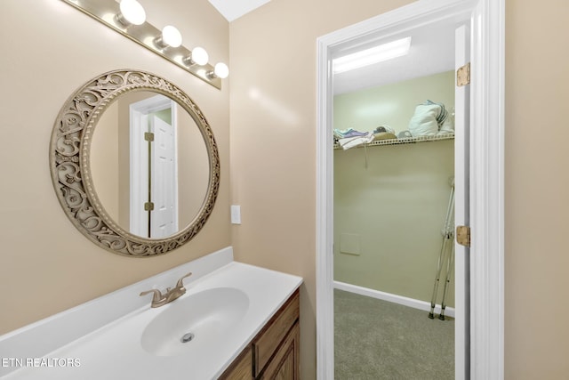 8040 Walt Way, Corryton, TN 37721 - bathroom featuring vanity and a spacious closet