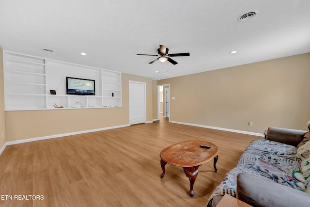 8040 Walt Way, Corryton, TN 37721 - living room featuring a ceiling fan, light wood-style floors, recessed lighting, and built in features