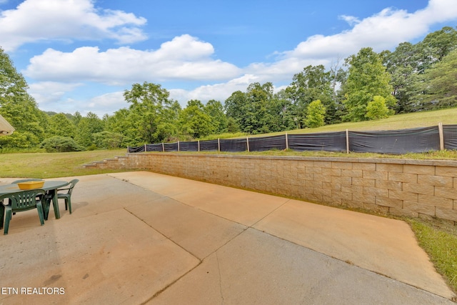 8040 Walt Way, Corryton, TN 37721 - view of home's community featuring a patio and outdoor dining area