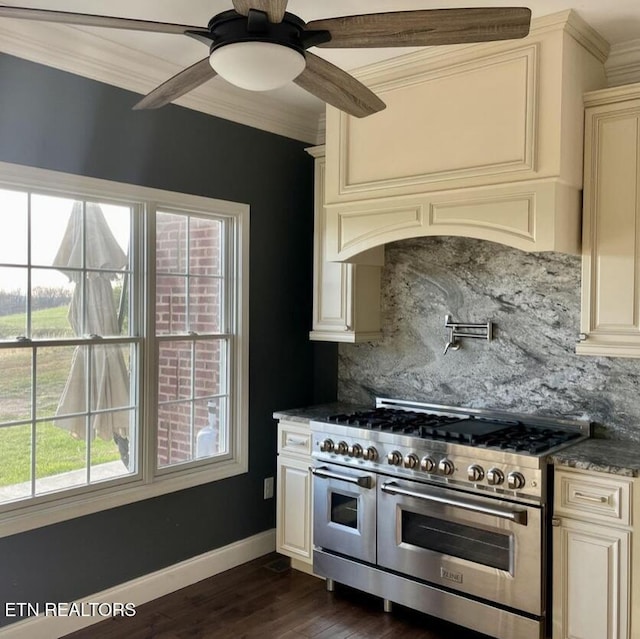 257 Holt Ridge Rd, Tazewell, TN 37879 - kitchen with range with two ovens, cream cabinetry, crown molding, tasteful backsplash, and dark wood-style floors