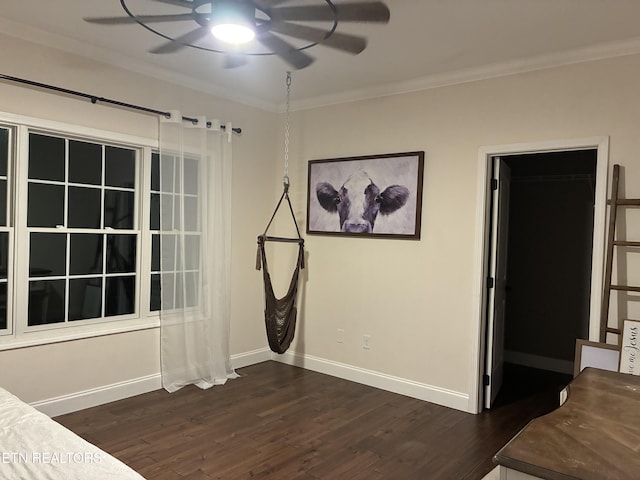257 Holt Ridge Rd, Tazewell, TN 37879 - unfurnished bedroom featuring dark wood-style floors, ornamental molding, and ceiling fan