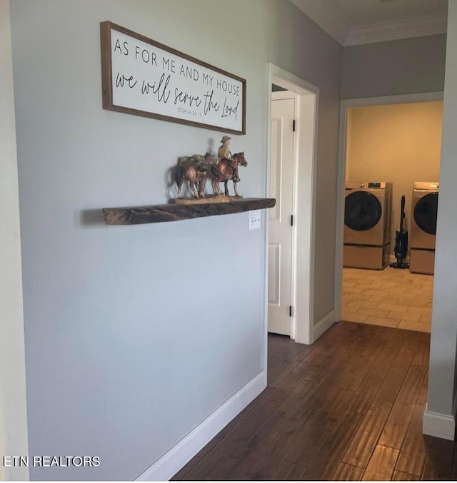 257 Holt Ridge Rd, Tazewell, TN 37879 - corridor with ornamental molding, dark wood finished floors, and independent washer and dryer