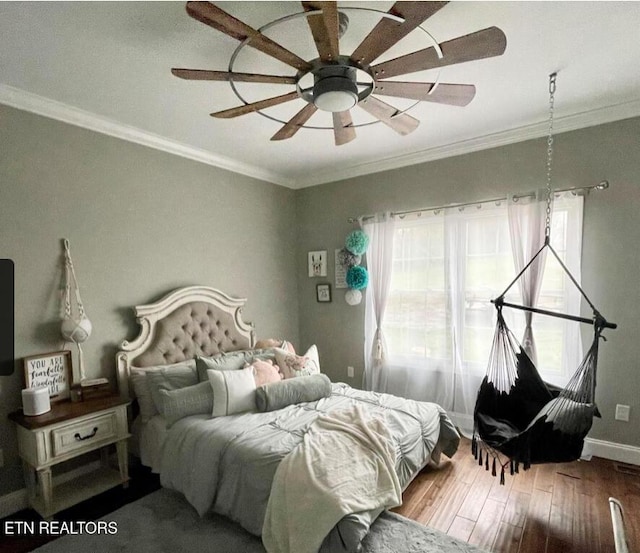 257 Holt Ridge Rd, Tazewell, TN 37879 - bedroom with multiple windows, crown molding, hardwood / wood-style flooring, and a ceiling fan