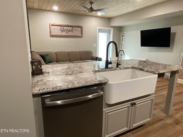 257 Holt Ridge Rd, Tazewell, TN 37879 - kitchen with dishwasher, open floor plan, a ceiling fan, light wood finished floors, and wooden ceiling