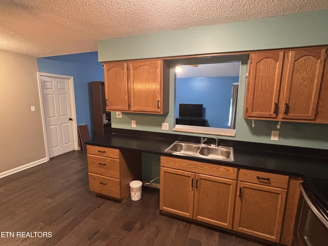 8022 Intervale Way, Powell, TN 37849 - kitchen featuring dark wood-style flooring, dark countertops, a textured ceiling, range, and brown cabinets