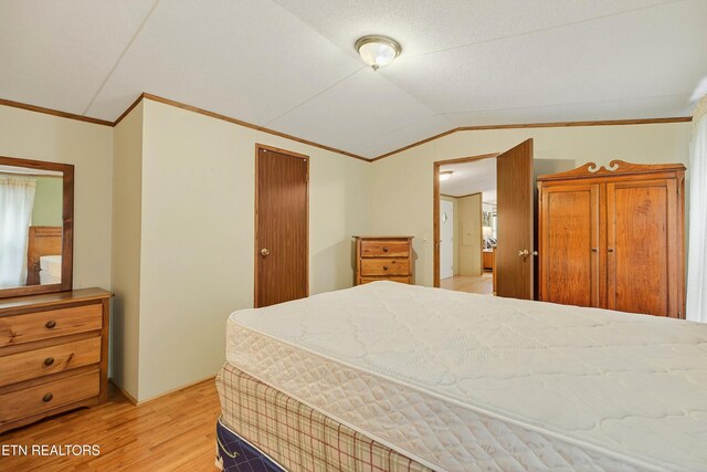 4334 Big Creek Rd, Hartford, TN 37753 - bedroom featuring crown molding, light wood finished floors, and lofted ceiling