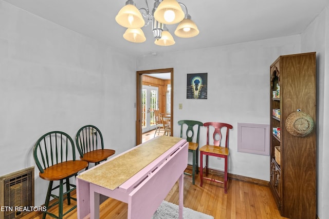 5400 Parkdale Rd, Knoxville, TN 37912 - dining room featuring a chandelier and light wood finished floors