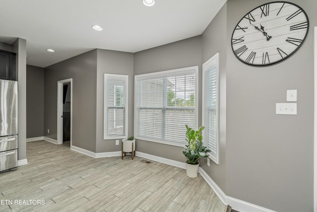 6126 Hollow View Ln, Knoxville, TN 37924 - unfurnished dining area with light wood finished floors and recessed lighting