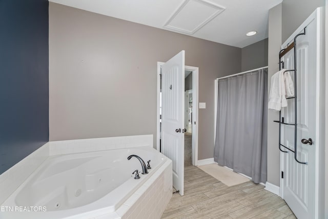 6126 Hollow View Ln, Knoxville, TN 37924 - bathroom featuring a jetted tub, wood finished floors, and a shower with shower curtain