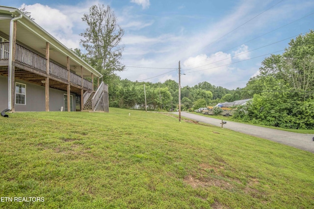 1359 Byrd Cir, Kingston, TN 37763 - view of grassy yard with stairway and a deck