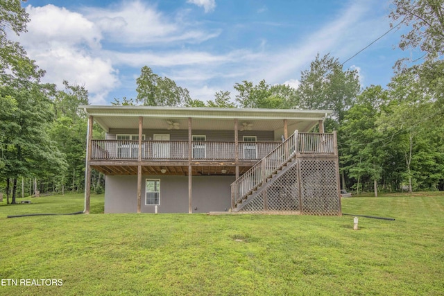 1359 Byrd Cir, Kingston, TN 37763 - rear view of property featuring a lawn, stairway, stucco siding, and a deck