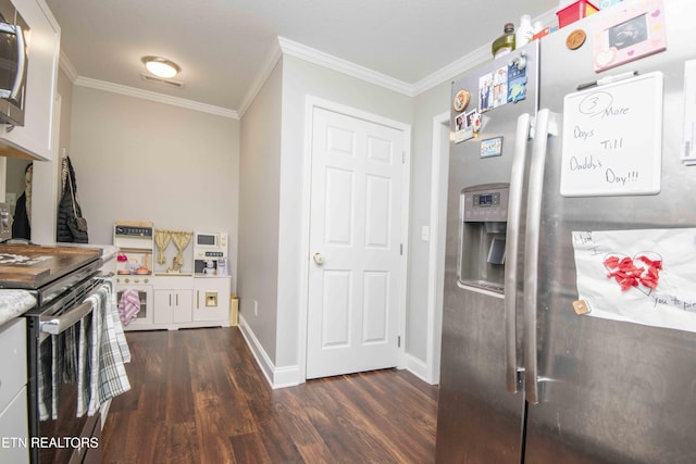 1359 Byrd Cir, Kingston, TN 37763 - kitchen featuring appliances with stainless steel finishes, dark wood-style floors, crown molding, and white cabinets