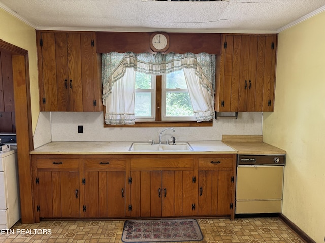 2101 NW Chillicothe St, Knoxville, TN 37921 - kitchen featuring light countertops, brown cabinetry, crown molding, and brick patterned flooring