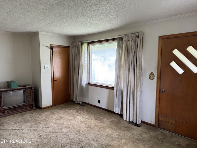 2101 NW Chillicothe St, Knoxville, TN 37921 - foyer with carpet and a textured ceiling