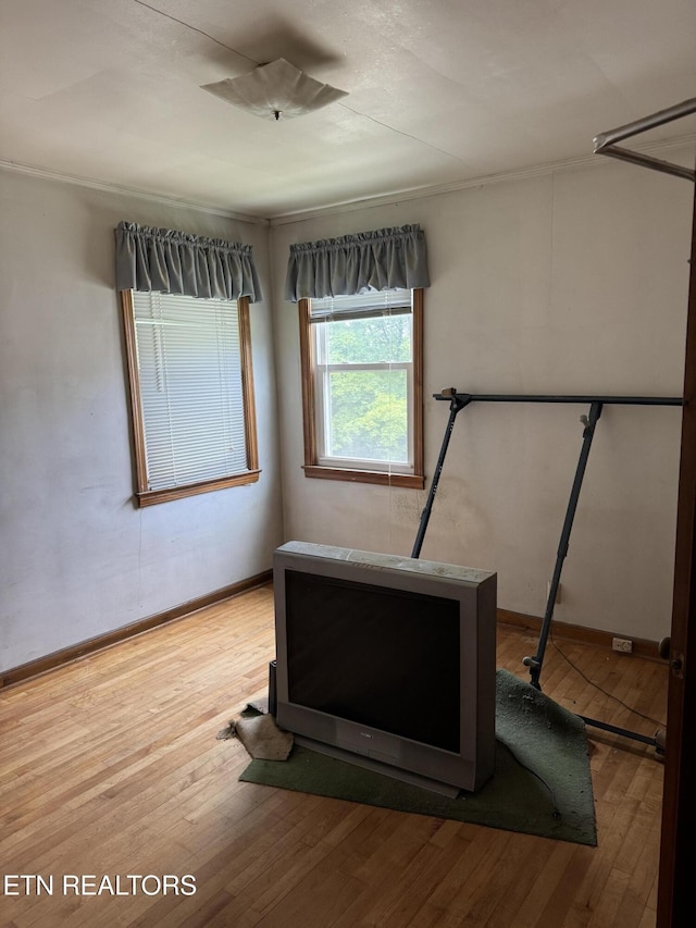 2101 NW Chillicothe St, Knoxville, TN 37921 - unfurnished bedroom featuring wood finished floors and baseboards