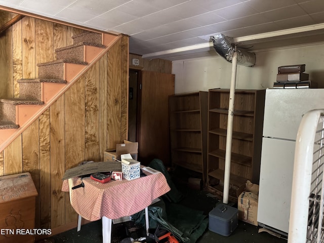 2101 NW Chillicothe St, Knoxville, TN 37921 - finished below grade area with freestanding refrigerator, stairway, and wood walls