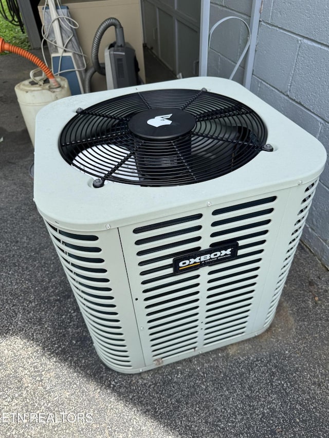 2101 NW Chillicothe St, Knoxville, TN 37921 - exterior view of a central AC unit and concrete block siding